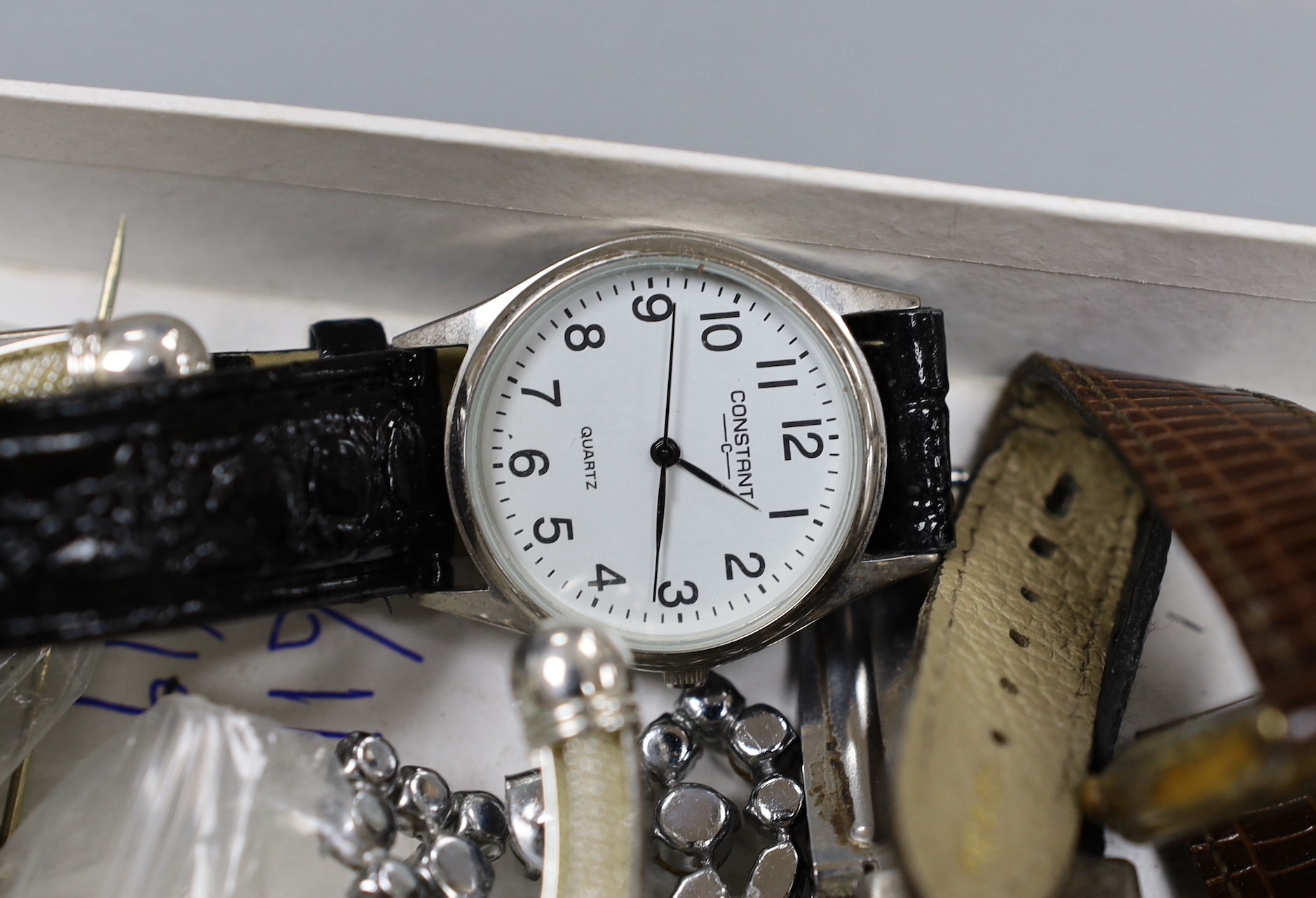 A group of assorted wrist watches, an Ingersoll pocket watch and sundries